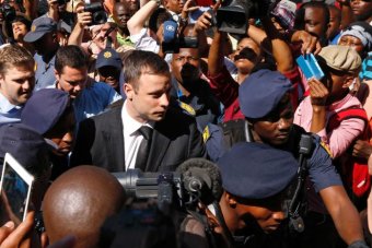 Olympic and Paralympic sprinter Oscar Pistorius started his five-year jail sentence on Tuesday for killing his girlfriend Reeva Steenkamp, marking the end of a trial that has gripped South Africa and millions around the world. His uncle, Arnold Pistorius, indicated he would not appeal.  As judge Thokozile Masipa gave her decision on the 27-year-old’s culpable homicide conviction, Pistorius, whose downfall has been likened to that of American football star O.J. Simpson, stood resolutely in the dock. His only reaction was to wipe his eyes before two police officers led him to the holding cells beneath the High Court in the heart of the South African capital. Ninety minutes later, an armored police vehicle carrying Pistorius – still dressed in dark suit, white shirt and black tie – left the building through a throng of reporters toward Pretoria Central Prison, where he is expected to serve his time. Once the execution site for opponents of South Africa’s former white-minority government, the jail is now home to the country’s most hardened criminals, including the man known as “Prime Evil”, apartheid death squad leader Eugene de Kock. Prisons officials said Pistorius, whose lower legs were amputated when he was a baby, would be housed in a separate and secure hospital wing of the massive complex. “ONE LAW FOR ALL” In delivering her decision, 67-year-old Masipa stressed the difficulty of arriving at a decision that was “fair and just to society and to the accused”. She also rebuffed suggestions that Pistorius – a wealthy and influential white man – might be able to secure preferential justice despite the “equality before law” guarantee enshrined in the post-apartheid 1996 constitution. “It would be a sad day for this country if an impression were created that there is one law for the poor and disadvantaged, and one law for the rich and famous,” she said. Steenkamp, a 29-year-old law graduate and model, died almost instantly on Valentine’s Day last year when Pistorius shot her through a locked toilet door at his luxury Pretoria home. Prosecutors pushed for a murder conviction, but the athlete maintained he fired in the mistaken belief an intruder was hiding behind the door, a defense that struck home in a country with one of the world’s highest rates of violent crime. The ruling African National Congress’ Women’s League, which is at the forefront of political efforts to tackle violence against South African women, on Tuesday called for an appeal by the state against the Sept. 12 culpable homicide conviction. But Steenkamp’s family said it was satisfied with the sentence. “Justice was served,” family lawyer Dup De Bruyn told reporters outside the court. The judge had given “the right sentence”, he said. “DARK AGES” GONE With no minimum sentence for culpable homicide, South Africa’s equivalent of manslaughter, Pistorius could have been punished with a few years of house arrest combined with community service. Before the decision, protesters picketed outside the court, a sign of the anger that might have ensued and the damage that might have been done to an often-criticized judicial system if the sentence were seen as too light. “Why are certain offenders more equal than others before the law?” said protester Golden Miles Bhudu, dressed in orange prison garb and wrapped in chains as he ridiculed Pistorius’ retching and crying during the seven-month trial, the first in South Africa to be broadcast live throughout. “He screams like a girl, he cries like a baby but he shoots like a soldier,” Bhudu said. However, Masipa pointed to the moral and philosophical changes South Africa has undergone since the end of white rule and the 1994 election of Nelson Mandela, saying the courts were no longer about mob justice and an “eye-for-an-eye”. “As a country we have moved on from the dark ages,” she said. “Society cannot always get what they want because courts do not exist to win popularity contests.” Many ordinary South Africans were unimpressed, especially after Pistorius’ defense lawyer, Barry Roux, said he expected the athlete to serve only 10 months of the five-year sentence behind bars, and the remainder under house arrest. “They are only scaring him with this sentence. It shows our society hasn’t transformed,” said Johannes Mbatha, a 38-year-old minibus taxi driver waiting at a Johannesburg bus station. “If it was a black man he would have never received such a light sentence. But that’s how things are in South Africa.” In Steenkamp’s home town of Port Elizabeth, a handful of family friends at a bar owned by her parents raised their hands in recognition of the five-year sentence. “I thought he would walk,” said 50-year-old Martin Cohen, who worked as a race horse trainer with Steenkamp’s father, Barry, who suffered a stroke shortly after his daughter’s killing.  The state prosecuting authority, which has two weeks to decide whether to launch an appeal against the verdict, said Pistorius was likely to serve at least a third of his sentence in prison or 20 months. On a separate conviction for firing a handgun in a packed Johannesburg restaurant, Pistorius was given a three-year suspended sentence. Even if he is freed early, Pistorius will not be able to resume his athletics career until his full term is served, the International Paralympic Committee said, ruling out any appearance at the 2016 Rio Olympics. Known as “Blade Runner” because of his carbon-fibre prosthetics, Pistorius became one of the biggest names in world athletics at the London 2012 Olympics when he reached the semi-finals of the 400m race against able-bodied athletes.