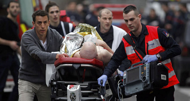 Charlie Hebdo: Gun attack on French magazine kills 12