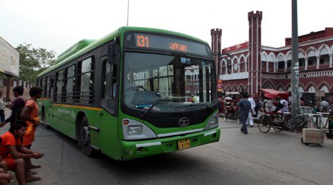 DTC bus runs over a school boy, angry residents set it ablaze