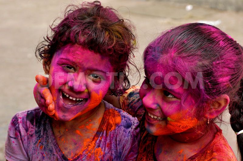 Colours rule streets as people celebrate Holi