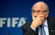 Fifa crisis: Blatter rebuffs Platini plea to resign and resolves to ride out scandal