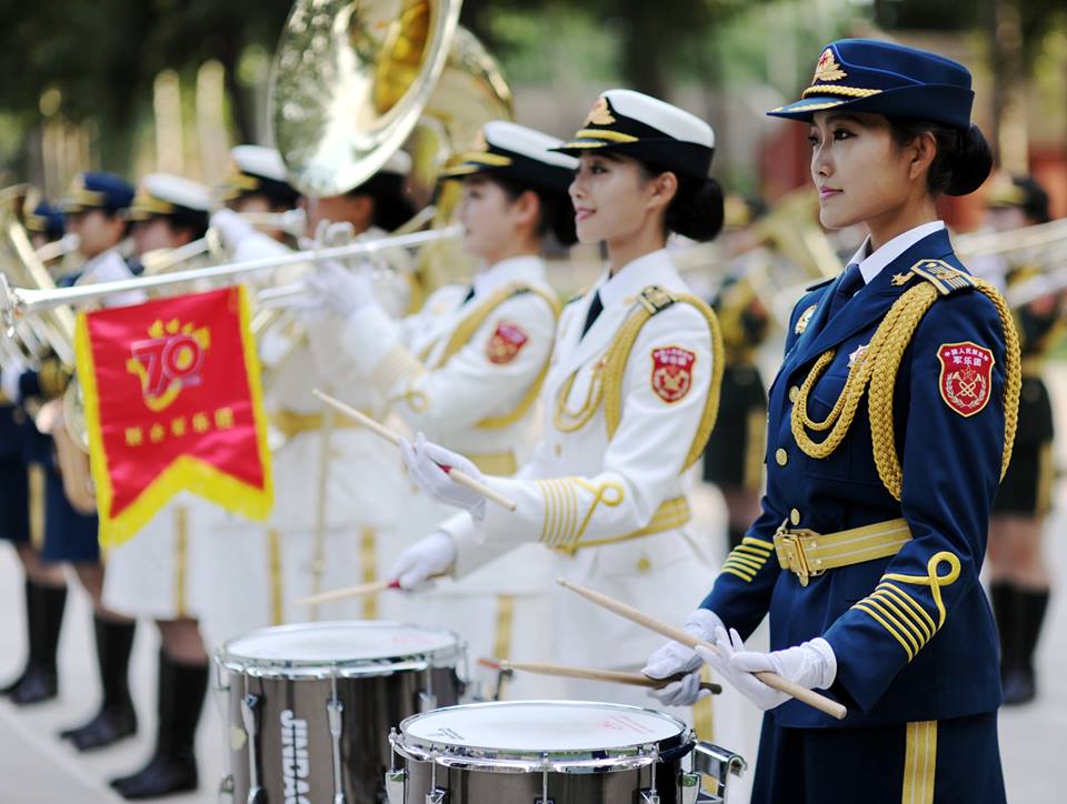 Female soldiers of the Military Band practice for the V-Day parade