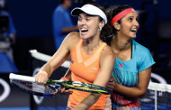 Sania, Martina labour into second round of French Open