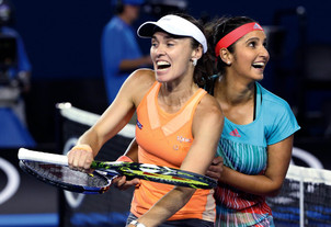 Sania, Martina labour into second round of French Open