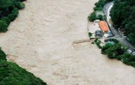 Heavy rain floods southern Japan, leaving over dozen missing